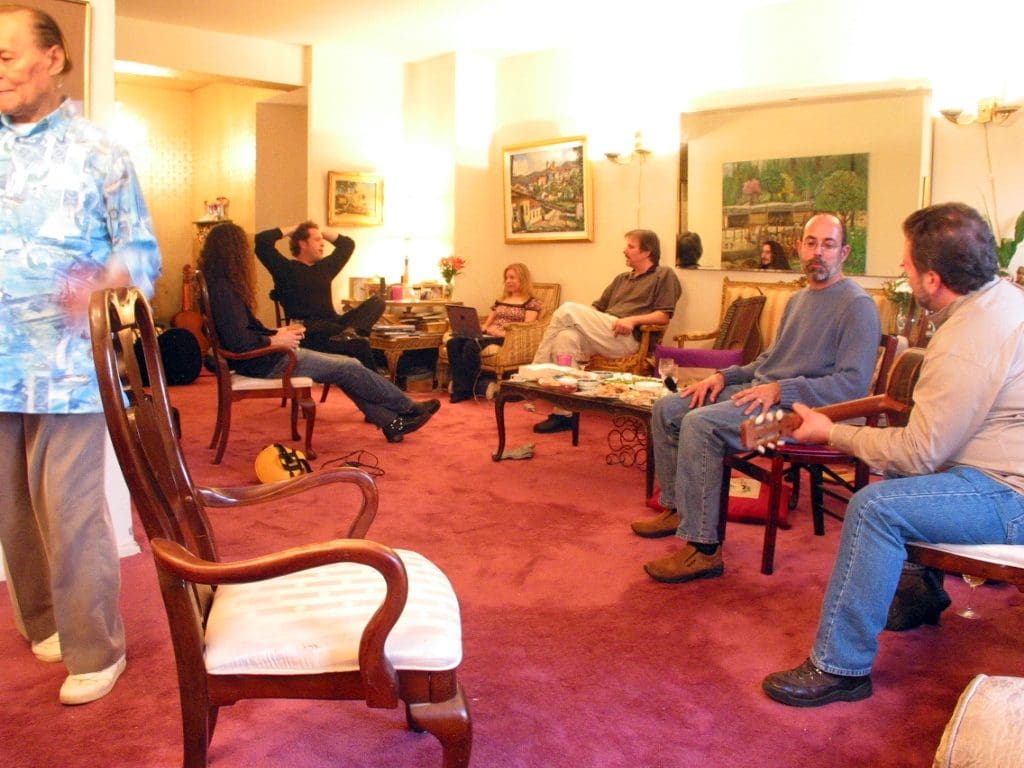 Nato Lima's apartment, filled with musicians and music fans. 